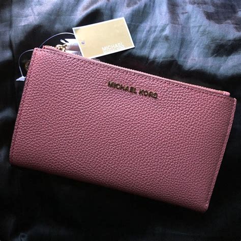 michael kors rose wallet|michael kors pink wristlet wallet.